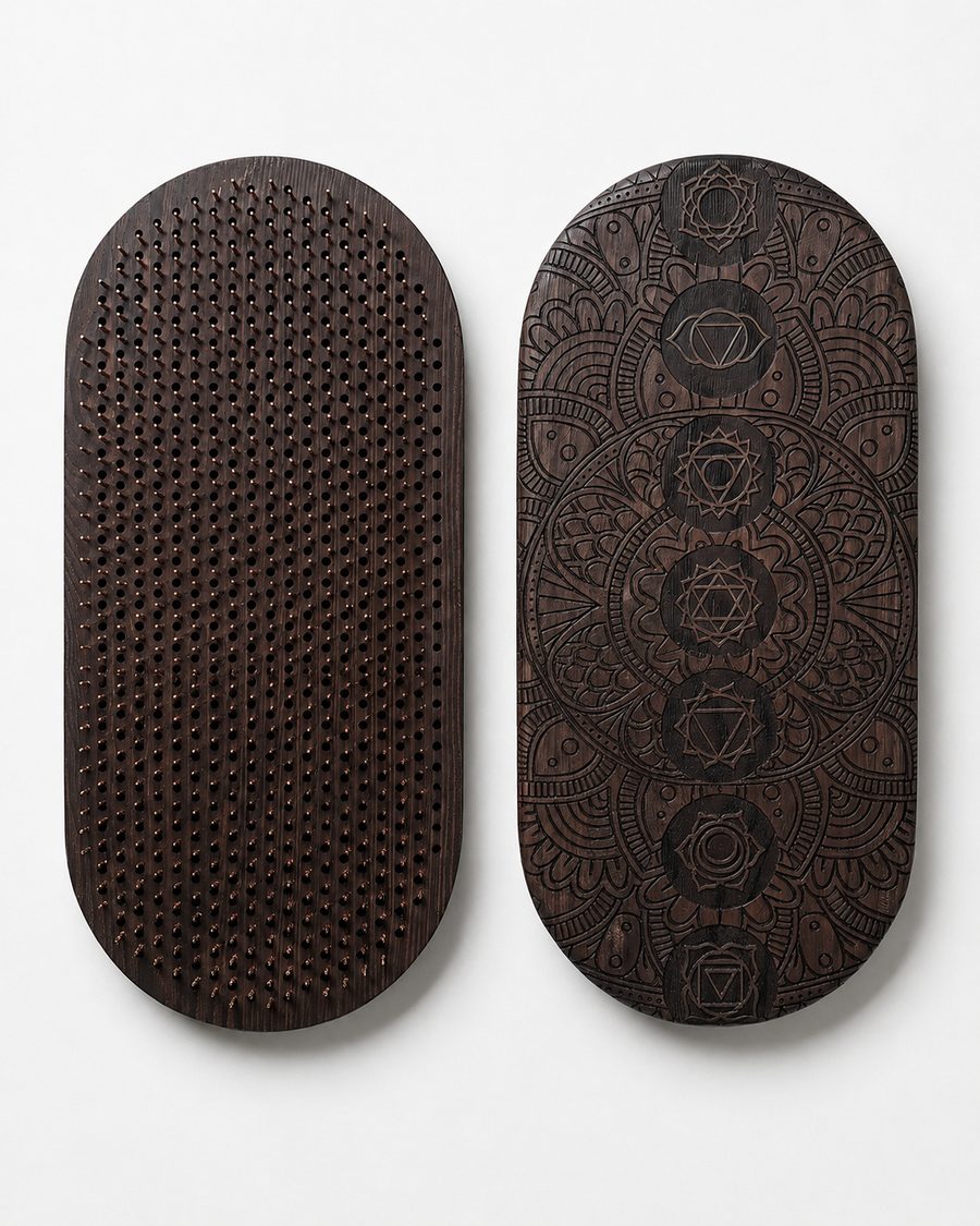 Two Bodybound boards standing upright, showing copper points and carved wood back